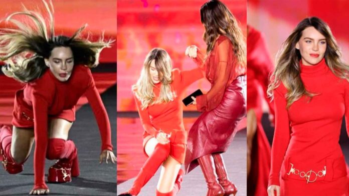 belinda caida desfile loreal